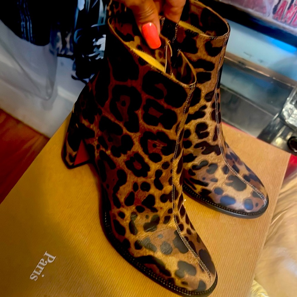 Louboutin 6.5 booties , leopard print not fur, great condition. Comfy